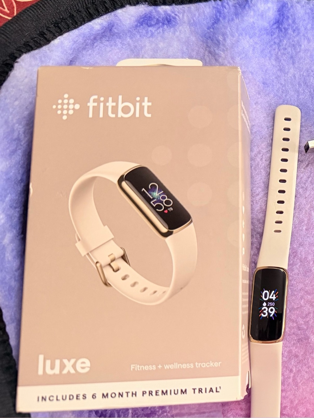 fitbit Luxe Tracker in Beige with gorjana parker link bracelate